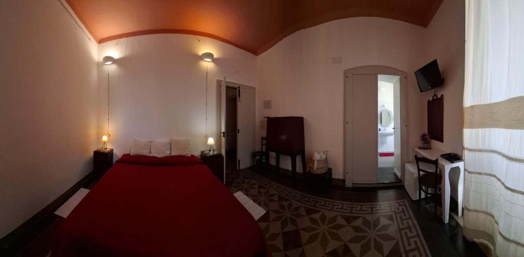 Aghinas Hotel Bosa Exterior photo